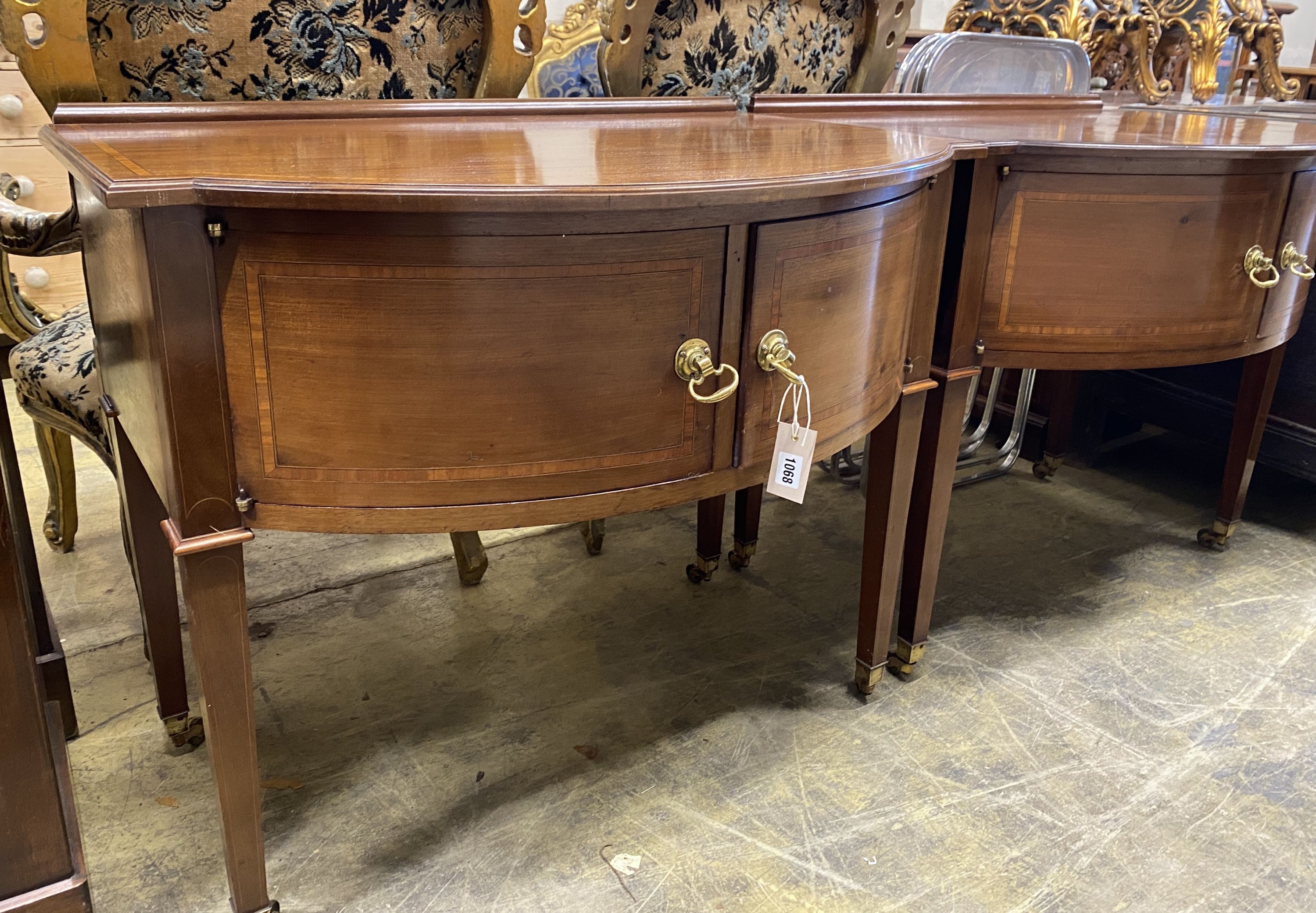 A pair of Edwardian satinwood banded mahogany bow front side cabinets, width 90cm, depth 60cm, height 78cm